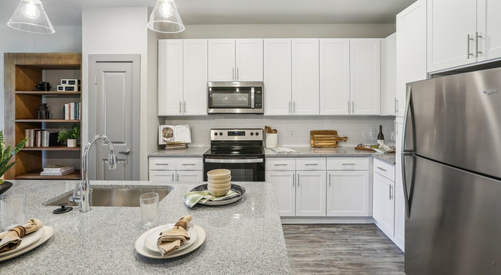Beautiful kitchens with designer finishes a kitchen with white cabinets