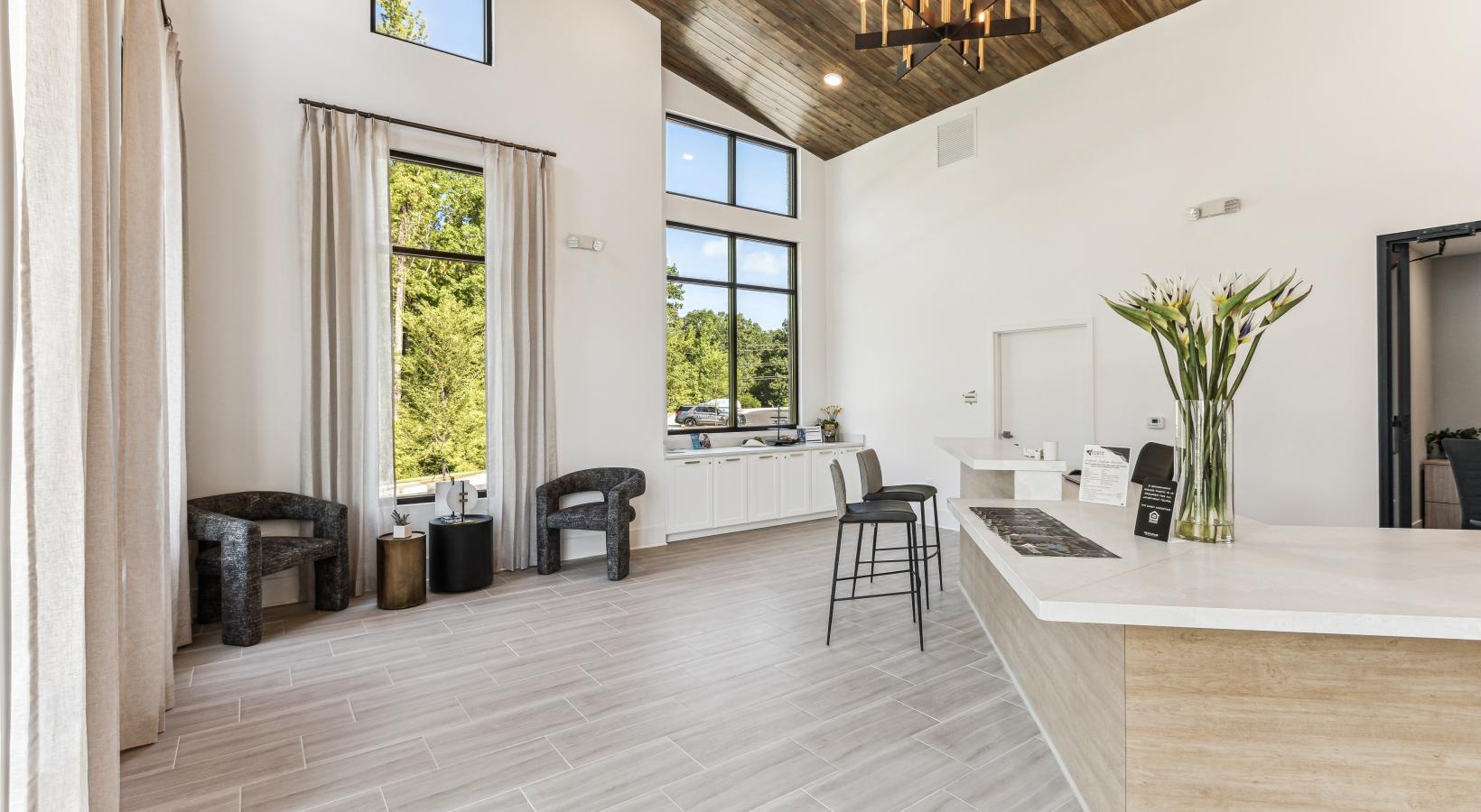 Enjoy our resident-only features a large room with a chandelier