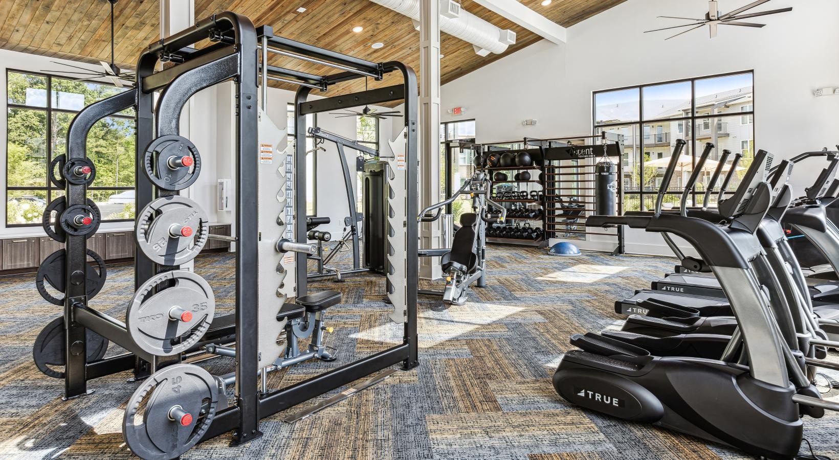 State-of-the-art amenities a gym with exercise equipment