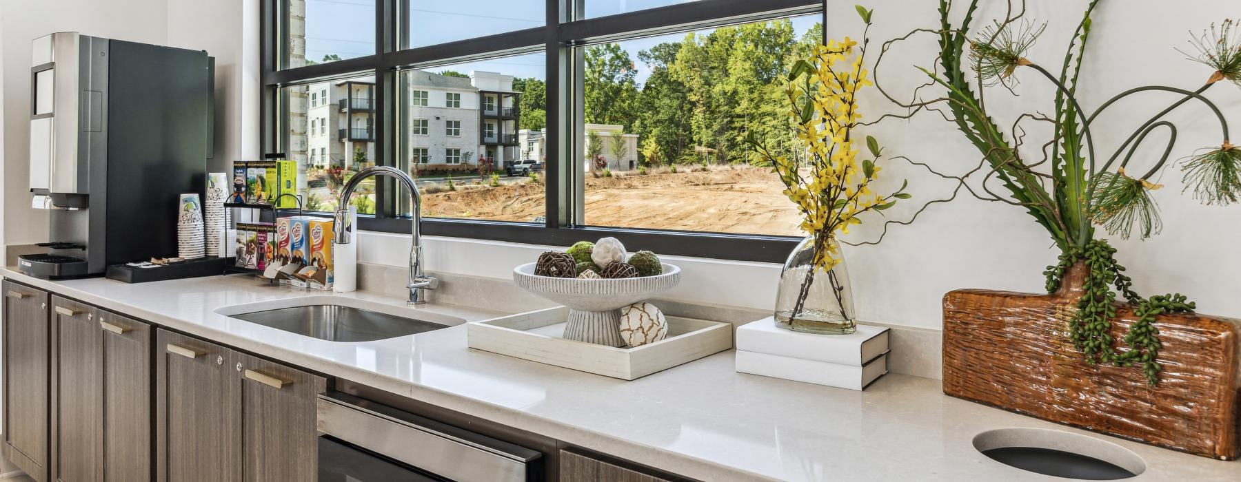 a kitchen with a large window