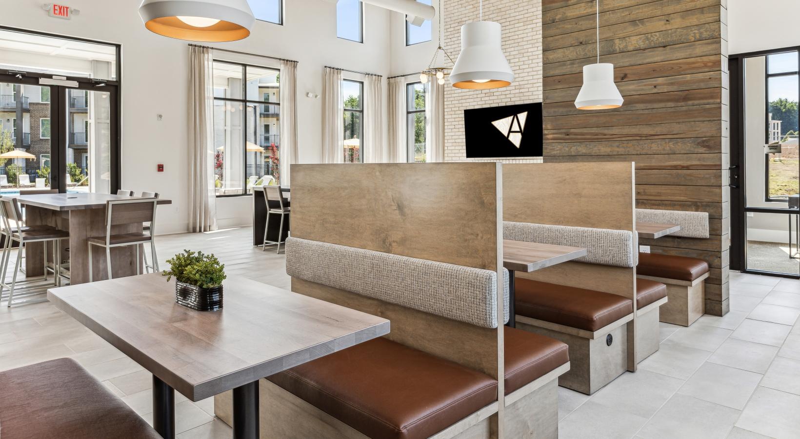 Access to resident-only features a room with a couch and tables