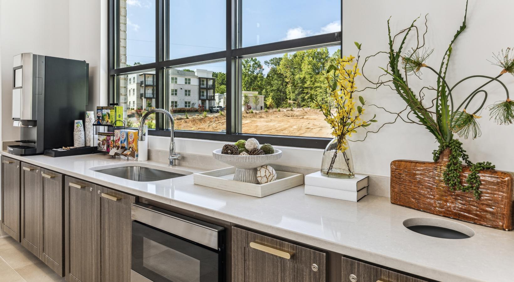 Settle into comfort at Accent Suwanee Creek a kitchen with a large window