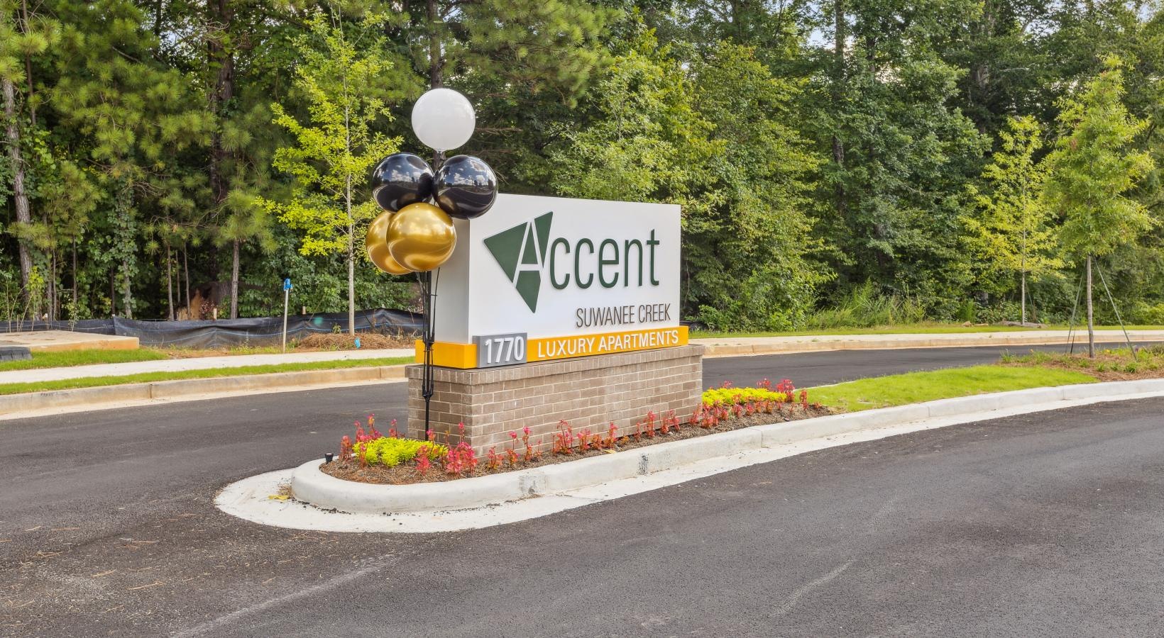 The essence of exceptional living a sign on the side of a road