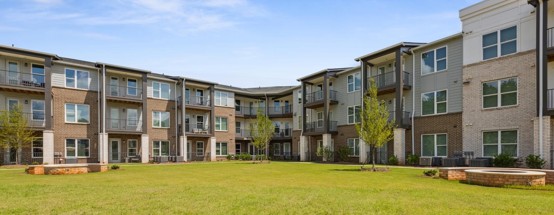 a building with a lawn in front