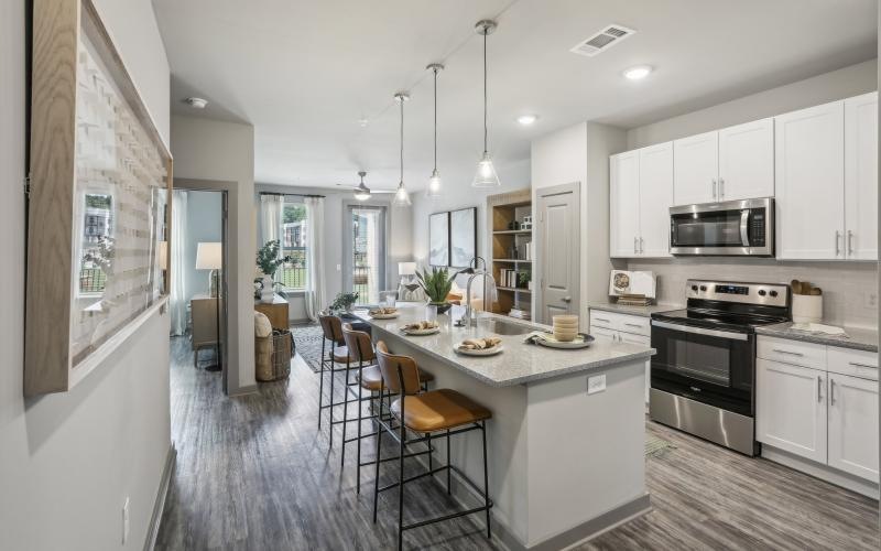 a kitchen with white cabinets