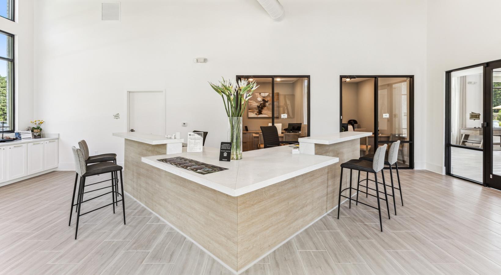 Access to resident-only features a large room with a large counter and chairs